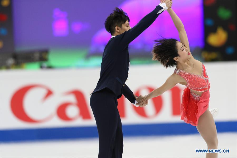 Sui Wenjing (R) and Han Cong of China perform during Pair Free Skating at ISU World Figure Skating Championships 2017 in Helsinki, Finland on March 30, 2017. Sui and Han claimed the title with 232.06 points in total. (Xinhua/Liu Lihang)