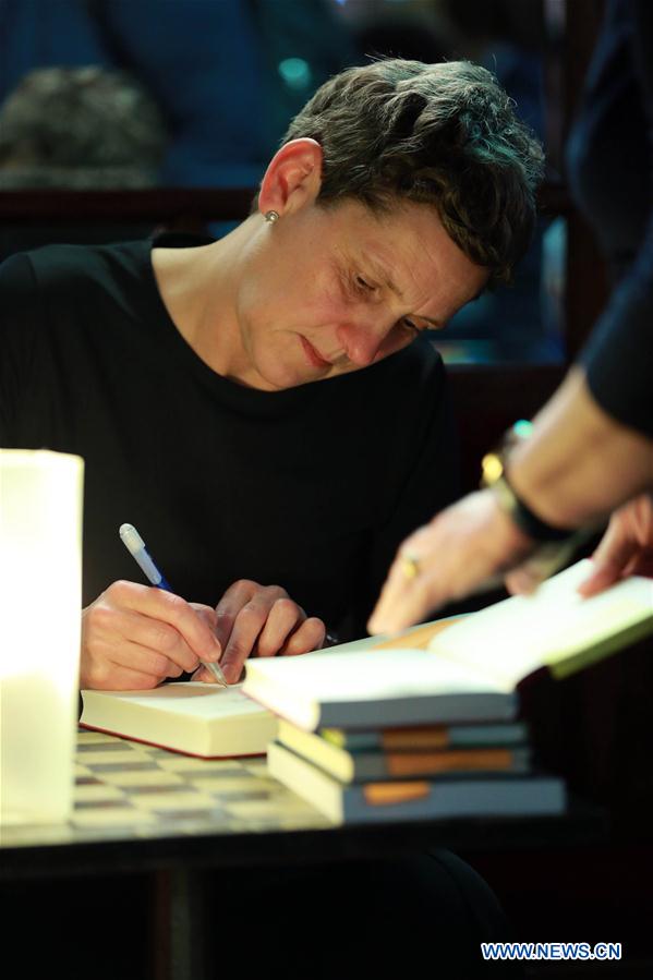 German writer Felicitas Hoppe signs her book for the readers at the 22nd Heidelberger Literaturtage in Heidelberg, Germany on June 3, 2016. 