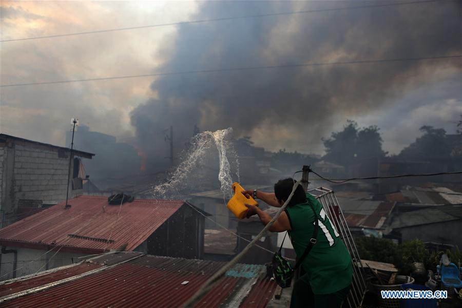 PHILIPPINES-QUEZON CITY-SLUM AREA-FIRE