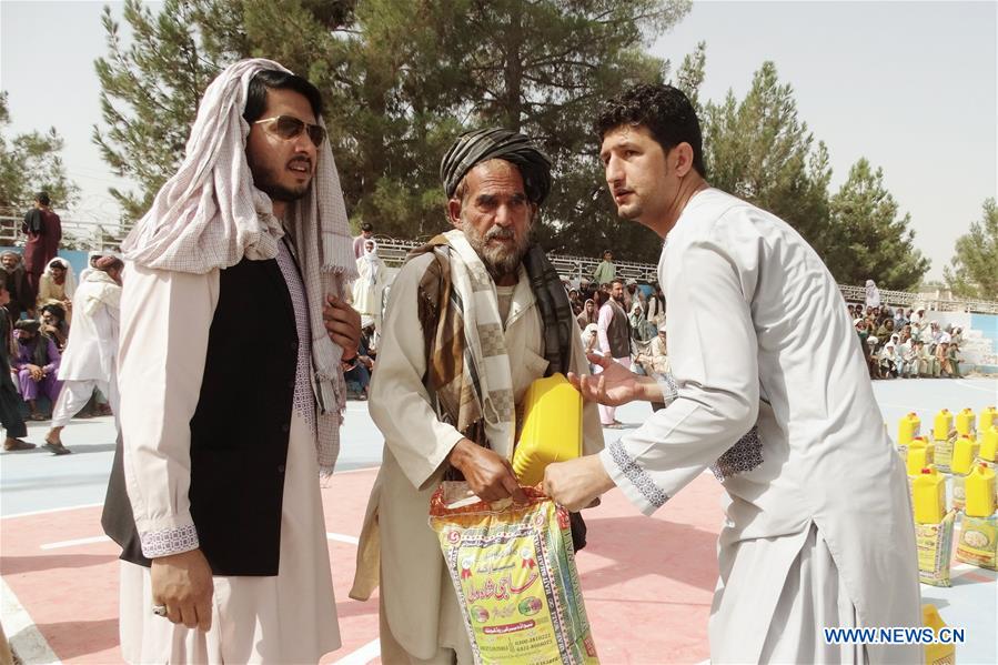 Photo taken on Aug. 11, 2016, shows relief goods donated by Afghan government in Helmand province, Afghanistan. 