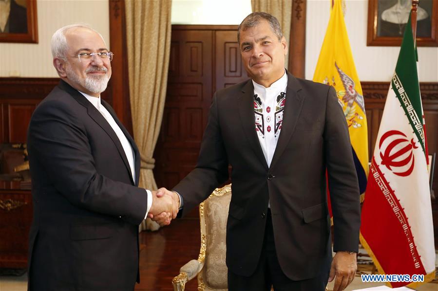 Rafael Correa (R), President of Ecuador, talks with Iranian Foreign Minister Mohammad Javad Zarif, during a bilateral meeting held in the Protocol Room of the Carondelet Palace, in Quito, capital of Ecuador, on Aug. 24, 2016.