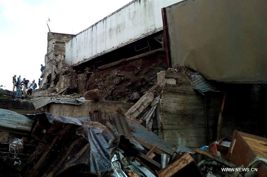 According to local press, at least nine people were killed in the landslide caused by heavy rain on Tuesday night in Villa Nueva.
