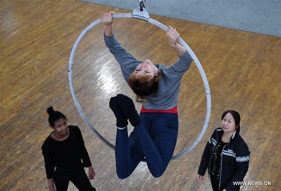 Foreign students from Ethiopia, Laos and other nations came to receive one-year training of acrobatics in Wuqiao in this July