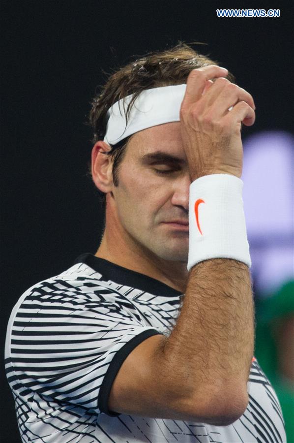 Australian Open: Federer beats Wawrinka 3-2