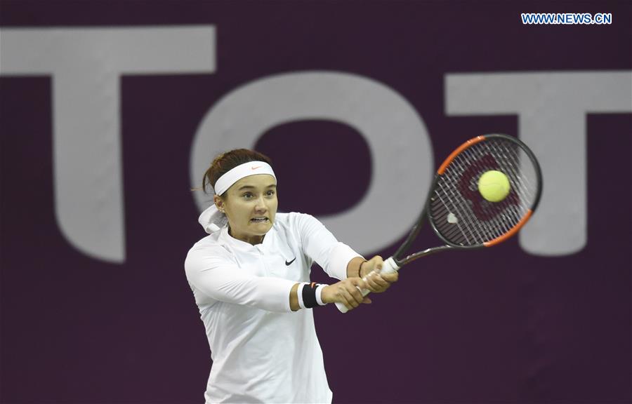 Lauren Davis of United States returns the ball during the women's singles 2nd round qualifying match against Wang Qiang of China at WTA Qatar Open 2017 at the International Khalifa Tennis Complex of Doha, Qatar, Feb. 12, 2017.