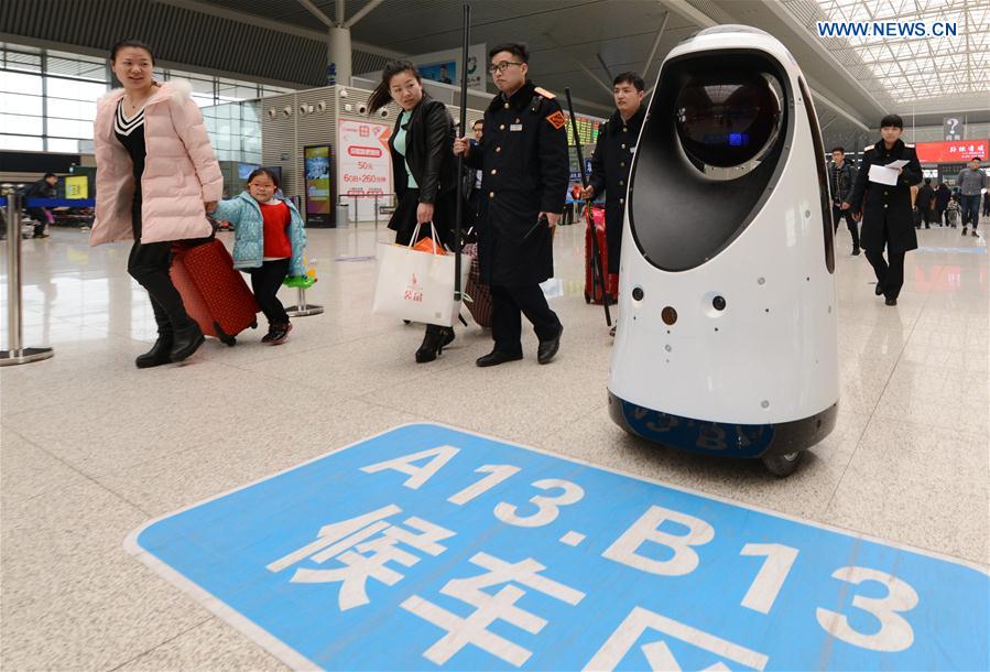 A robot patrols at the Zhengzhou East Railway Station in Zhengzhou, capital of central China's Henan Province, Feb. 15, 2017. 