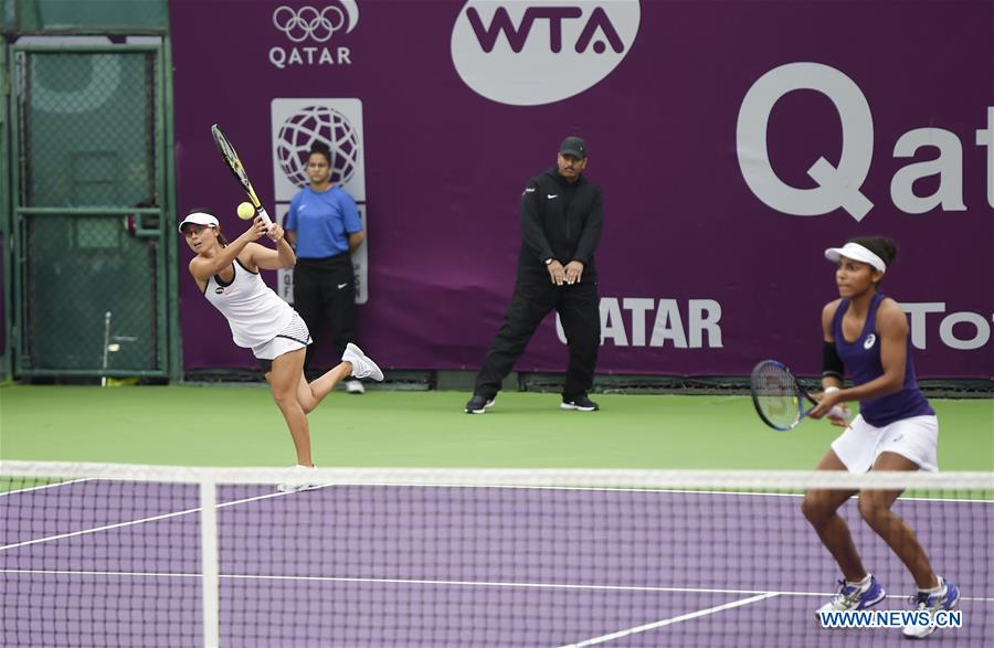 Xu Yifan (L) of China and Raquel Atawo of the United States compete during the women's doubles 1st round match against Sania Mirza of India and Barbora Strycova of Czech Republic at WTA Qatar Open 2017 at the International Khalifa Tennis Complex of Doha, Qatar, Feb. 16, 2017. Mirza and Strycova won 2-0. (Xinhua/Nikku) 