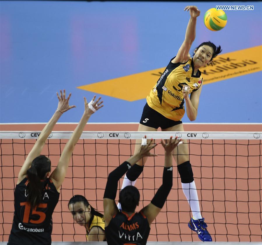 Vakifbank player Zhu Ting (Back) spikes the ball during CEV Champions League Group D match between Vakifbank and Eczacibasi in Istanbul, Turkey, on Feb. 22, 2017. 