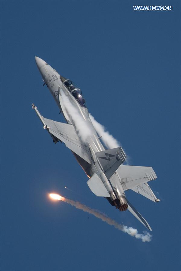 A F-18F Super Hornet performs at the Australian International Aerospace and Defence Exposition at the Avalon Airfield, southwest of Melbourne, Australia, on Feb. 28, 2017.