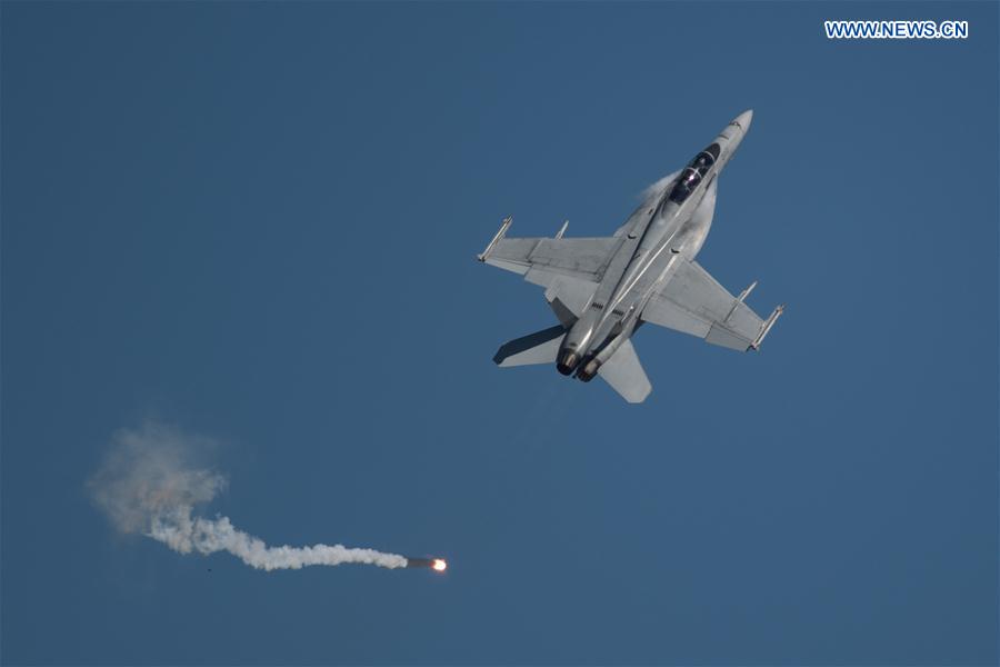 A F-18F Super Hornet performs at the Australian International Aerospace and Defence Exposition at the Avalon Airfield, southwest of Melbourne, Australia, on Feb. 28, 2017. 