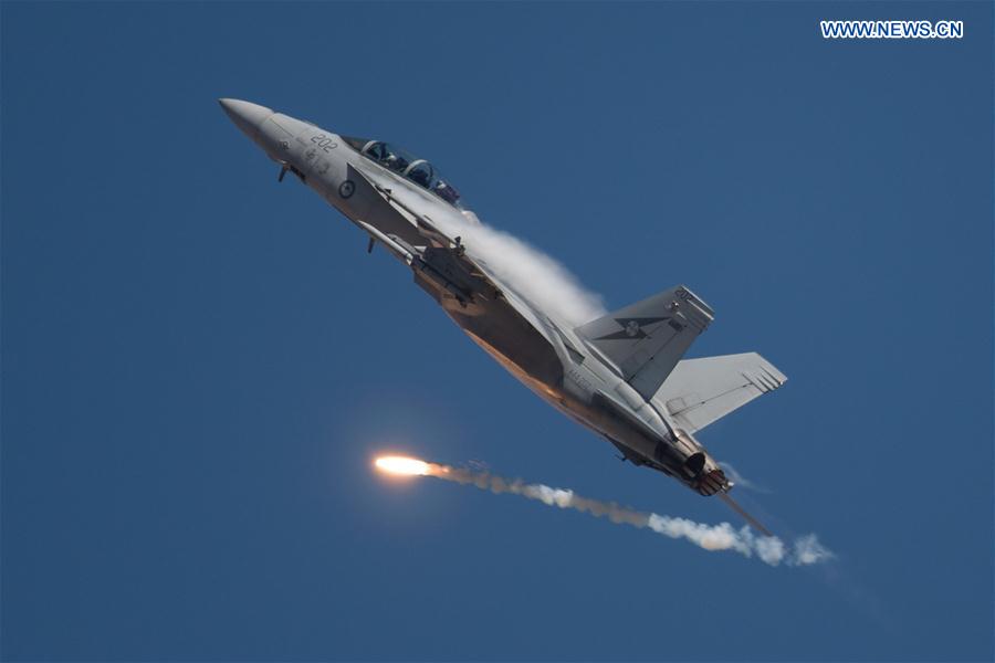 A F-18F Super Hornet performs at the Australian International Aerospace and Defence Exposition at the Avalon Airfield, southwest of Melbourne, Australia, on Feb. 28, 2017. 