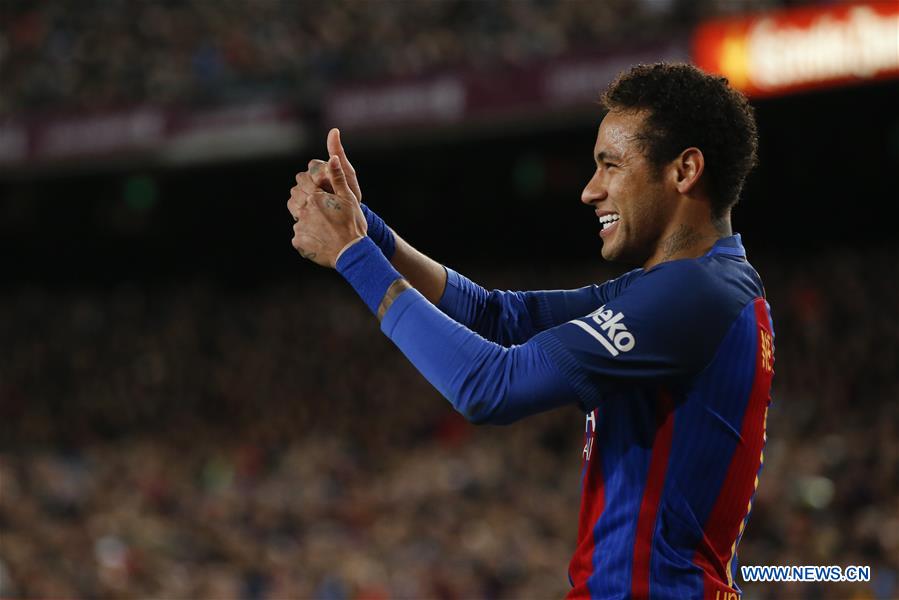 Barcelona's Neymar gestures after a failed attempt on goal during the Spanish first division soccer match between FC Barcelona and Celta de Vigo at the Camp Nou Stadium in Barcelona, Spain, March 4, 2017. Barcelona won 5-0. 