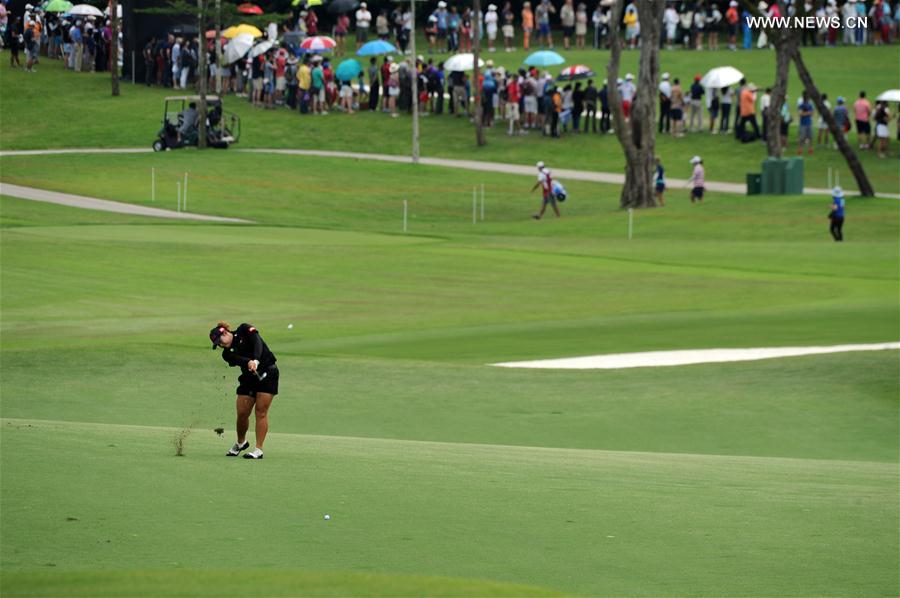 Ariya Jutanugarn of Thailand, competes during the HSBC Women's Champions golf tournament held at Singapore's Sentosa Golf Club on March 5, 2017. 