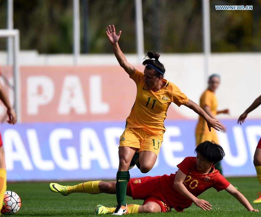 Zhang Rui(Bottom) of China vies with Lisa De Vanna of Australia during the last round of Group C match between China and Australia at the Algarve Cup 2017 women's soccer tournament in Albufeira, Portugal on March 6, 2017.