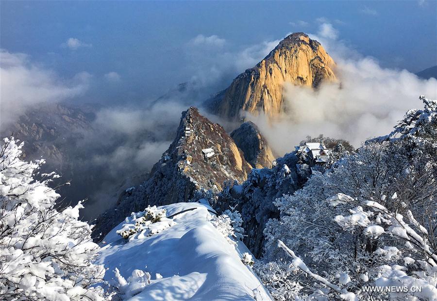 Photo taken on March 14, 2017 shows the scenery of the Huashan Mountain after snow in northwest China's Shaanxi Province.