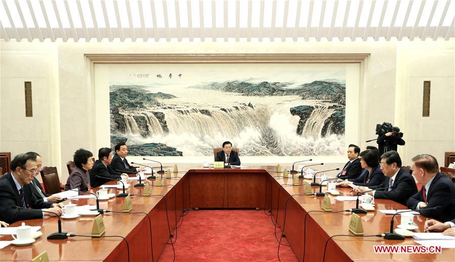 Zhang Dejiang, executive chairperson of the presidium for the fifth session of China's 12th National People's Congress (NPC) and chairman of the Standing Committee of the NPC, presides over the third meeting of executive chairpersons of the presidium at the Great Hall of the People in Beijing, capital of China, March 14, 2017. (Xinhua/Ma Zhancheng) 