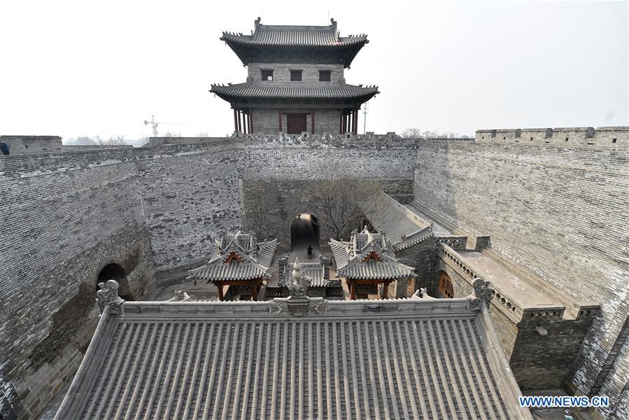 Photo taken on March 16, 2017 shows a gatetower of the ancient county seat of Taiyuan, in Jinyuan District of Taiyuan City, capital of north China's Shanxi Province. Established in 1375, the ancient county seat is well preserved over the last 600 years. (Xinhua/Zhan Yan) 