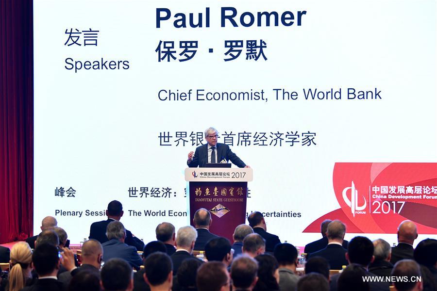 The theme of this year's forum is 'China and the World: Economic Transformation through Structural Reforms'. 