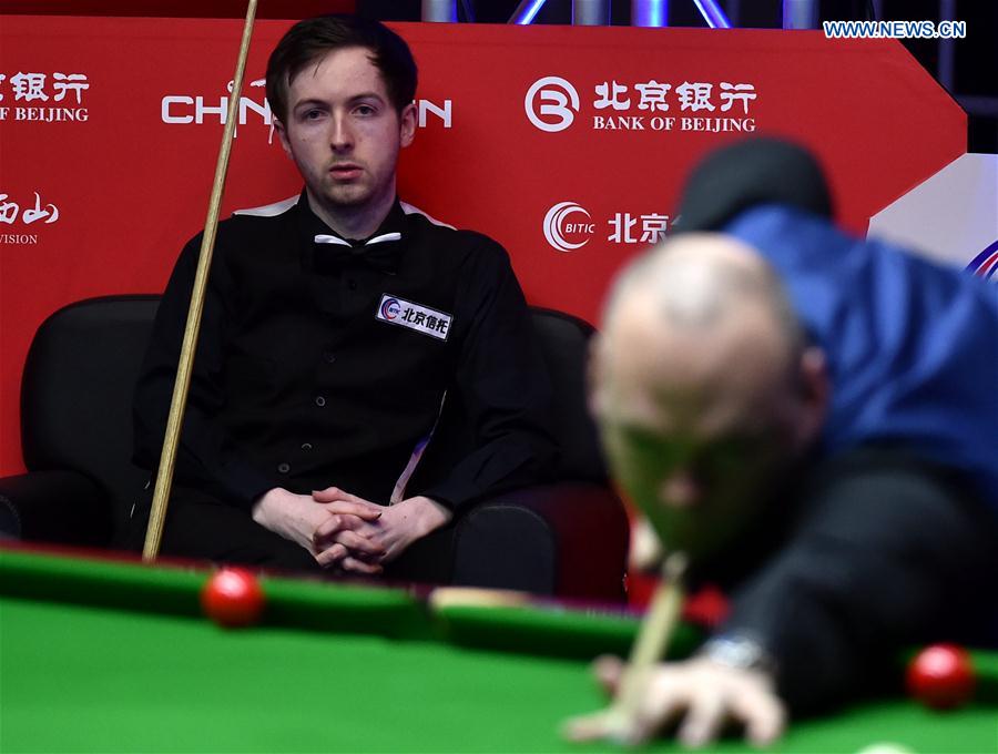 Scott Donaldson of Scotland looks on during the first round of 2017 World Snooker China Open Tournament against Stuart Bingham of England, in Beijing, capital of China, March 27, 2017. 