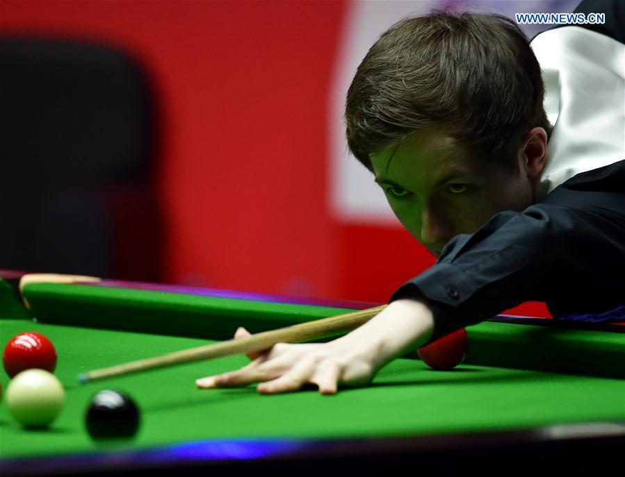 Scott Donaldson of Scotland competes during the first round of 2017 World Snooker China Open Tournament against Stuart Bingham of England, in Beijing, capital of China, March 27, 2017. 