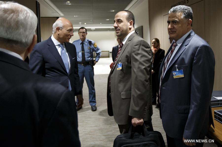 The UN Deputy Special Envoy for Syria Ramzy Ezzeldin Ramzy (1st L) and Syria's opposition delegation leader Nasr al-Hariri attend a meeting of Syria peace talks in Geneva, Switzerland, on March 27, 2017. (Xinhua/POOL/Salvatore Di Nolfi) 