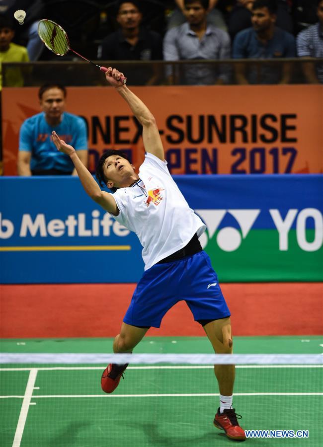 Tian Houwei of China competes during the first round of men's single against Wei Nan of Hong Kong, China in Yonex Sunrise Indian Open Badminton Championship in New Delhi, India, March 29, 2017. Tian Houwei won 2-0.