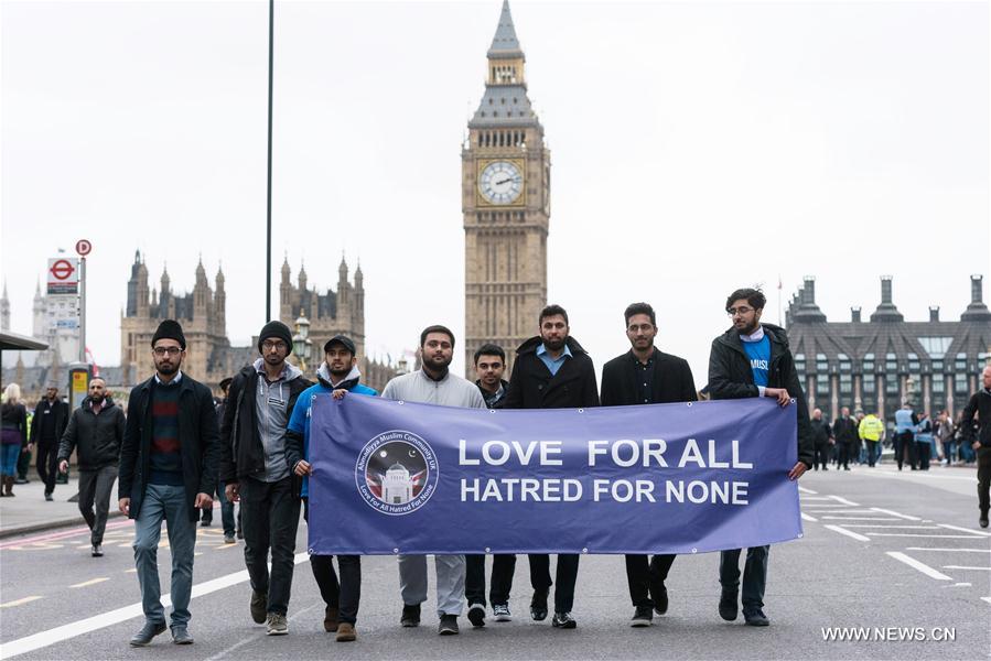 Members of muslim community attend an event on Westminster Bridge to commemorate the victims of last week's terror attacks in London, Britain on March 29, 2017.