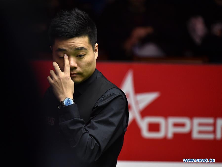 Ding Junhui of China reacts during the 3rd round match against Mark Joyce of England at the 2017 World Snooker China Open Tournament in Beijing, capital of China, March 30, 2017. Ding won 5-3. (Xinhua/Zhang Chenlin) 