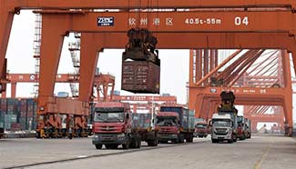 China's exports slow, imports rebound in May