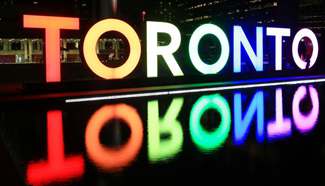 Toronto sign lit up to honour Orlando shooting victims