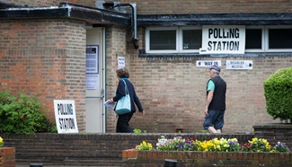 British voters go to polling stations for EU referendum