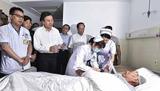 State Councilor visits tornado victim in east China