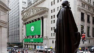 Messaging app maker Line debuts on NYSE