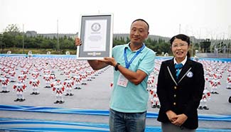 Robots dance together to set new Guinness World Record in Qingdao
