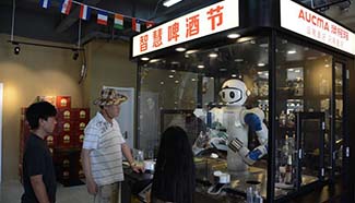 Robot to serve you at Qingdao Int'l Beer Festival
