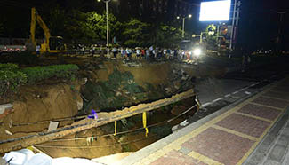 Road collapsed in Zhengzhou, C China's Henan
