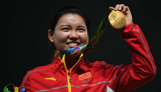 Pistol shooter Zhang Mengxue wins China's first gold in Rio
