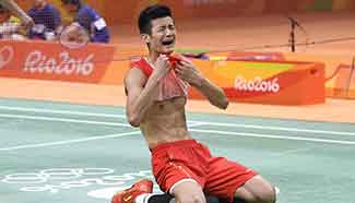 Chen Long claims title in men's singles final of badminton