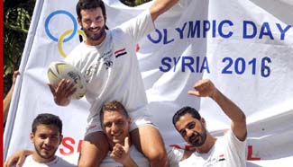 Syrian athletes celebrate Syrian Olympic Day in Damascus