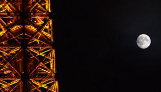 In pics: moon over Eiffel Tower in Paris during Mid-Autumn Festival