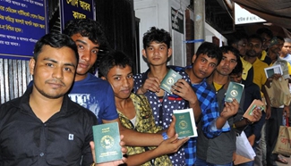 Bangladeshis receive medical examinations for getting job in Saudi Arabia