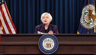 U.S. Fed keeps rates unchanged, signals one rate hike by year-end