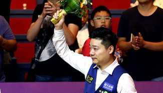 Ding Junhui claims title at Shanghai Masters world snooker tournament