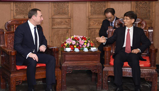 Meng Jianzhu meets with Belarusian senior official in Beijing