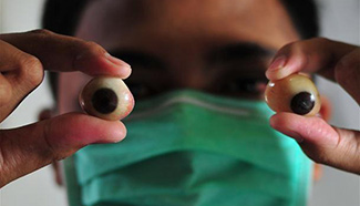 Ocularist makes prosthetic eye in Jakarta, Indonesia