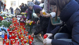 People commemorate victims of Colectiv nightclub fire in Bucharest