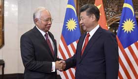 Chinese president meets Malaysian PM in Beijing