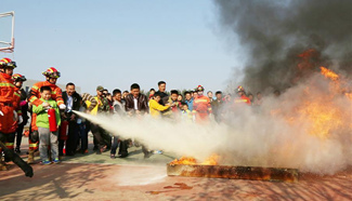 Fire fighting public event held in east China