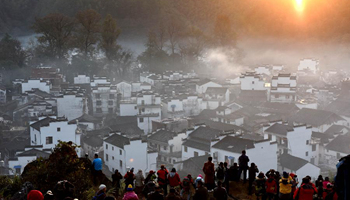 Early morning fog scenery of Shicheng Village in east China's Wuyuan