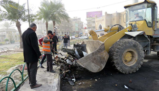 At least 4 killed, 9 wounded in bomb attack in Baghdad